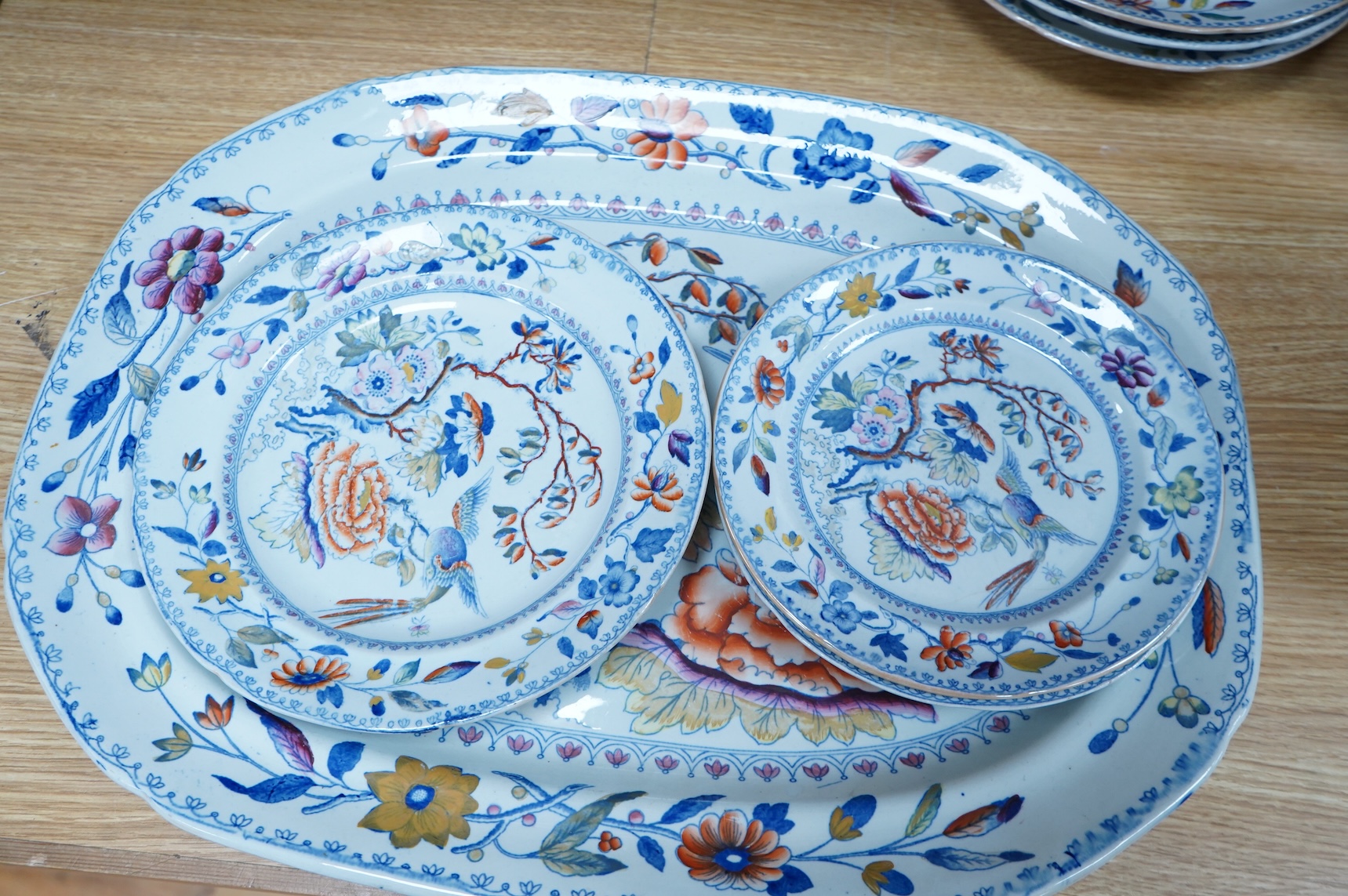 An early 19th century Davenport ironstone part dinner service, eight items, and four matching Stone China dessert dishes, meat plate 50cm